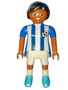 Playmobil female dark skin soccer player, white and blue striped shirt